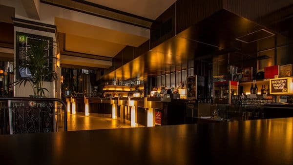 Warm restaurant bar interior with ambient lighting